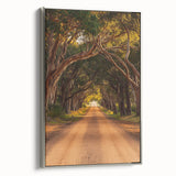 Framed canvas artwork showcasing a serene countryside landscape in vibrant colors, featuring a silver frame, perfect for home decor enhancement and art enthusiasts.