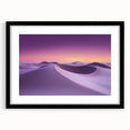 Framed landscape artwork depicting a serene desert scene, featuring warm earthy tones and intricate details, encased in a sleek black frame with a mat.
