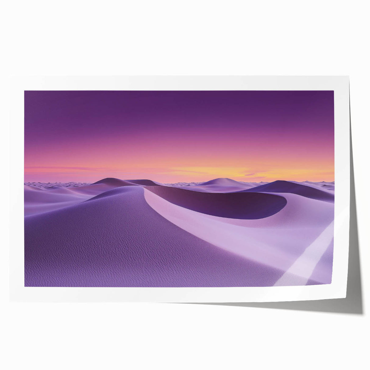 Desert landscape rolled print showcasing vibrant hues of orange and gold, featuring intricate details of sand dunes and a clear blue sky, packaged securely in a cardboard tube.