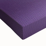 Close-up of a stretched canvas artwork depicting a vibrant desert landscape, showcasing rich hues of orange and gold with intricate details, perfect for home decor.