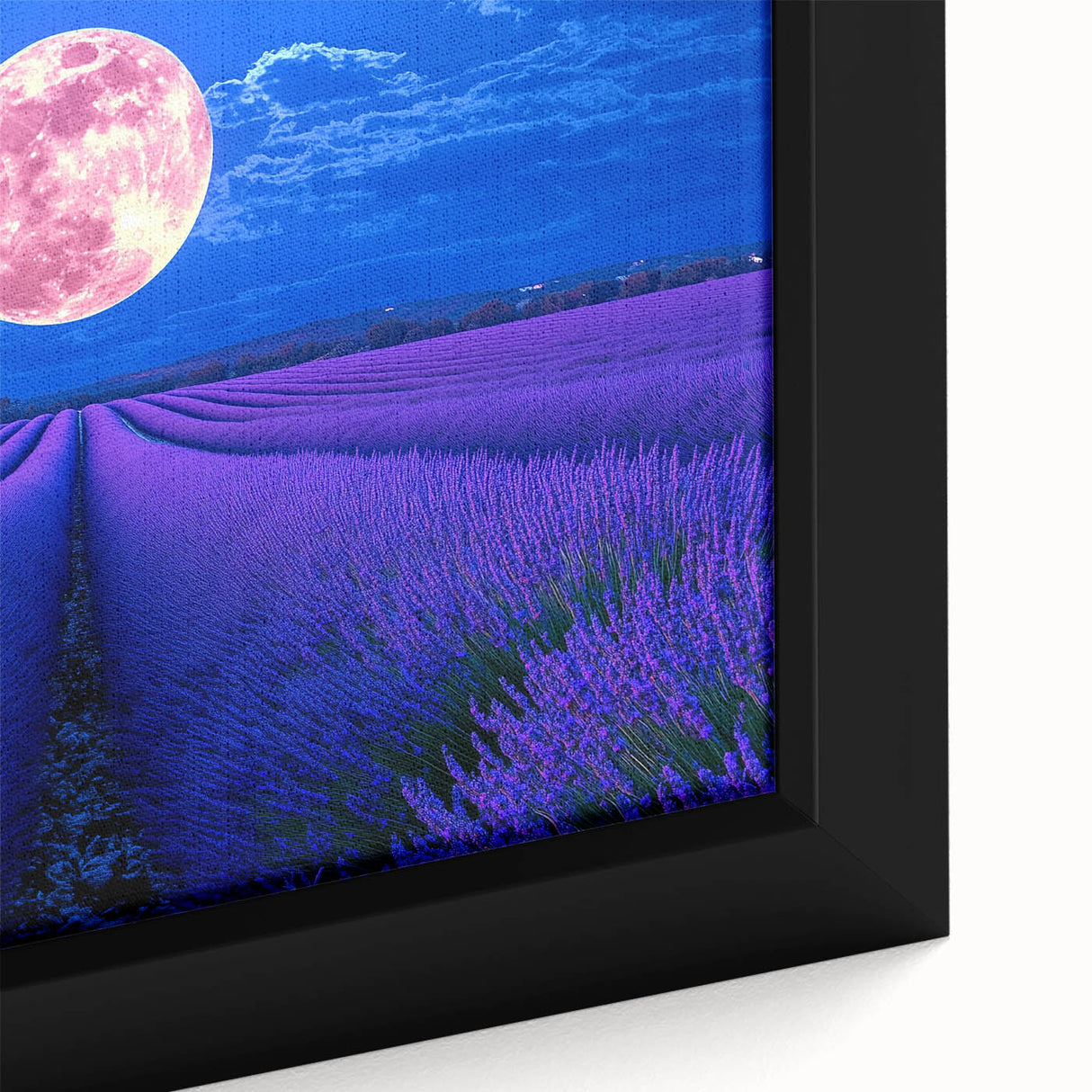 Close-up of a framed landscape canvas print showcasing vibrant green fields under a bright blue sky, perfect for home decor and nature enthusiasts.