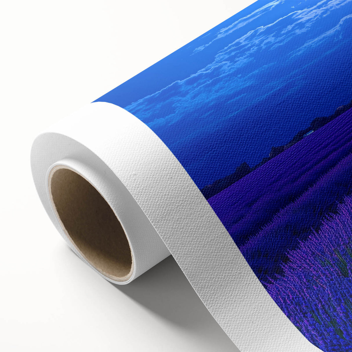 Vibrant rolled canvas artwork depicting serene landscapes with lush green fields and a clear blue sky, elegantly packaged in a protective cardboard tube for easy transport and display.