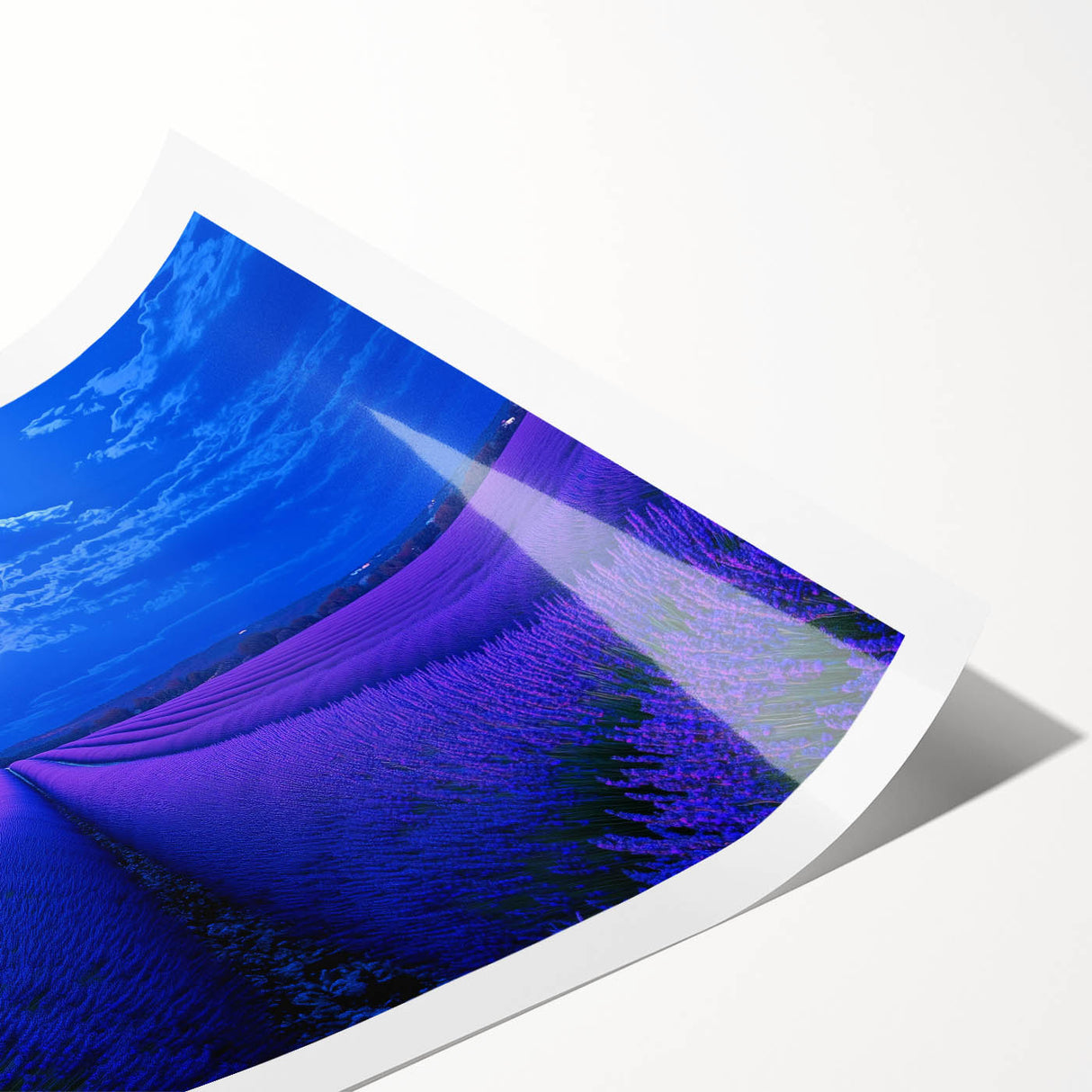 Vibrant rolled canvas print showcasing a serene landscape with rolling green fields under a clear blue sky, elegantly packaged in a protective cardboard tube.