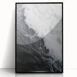 Large abstract wall art featuring swirling blue and green patterns on acrylic, framed in black.