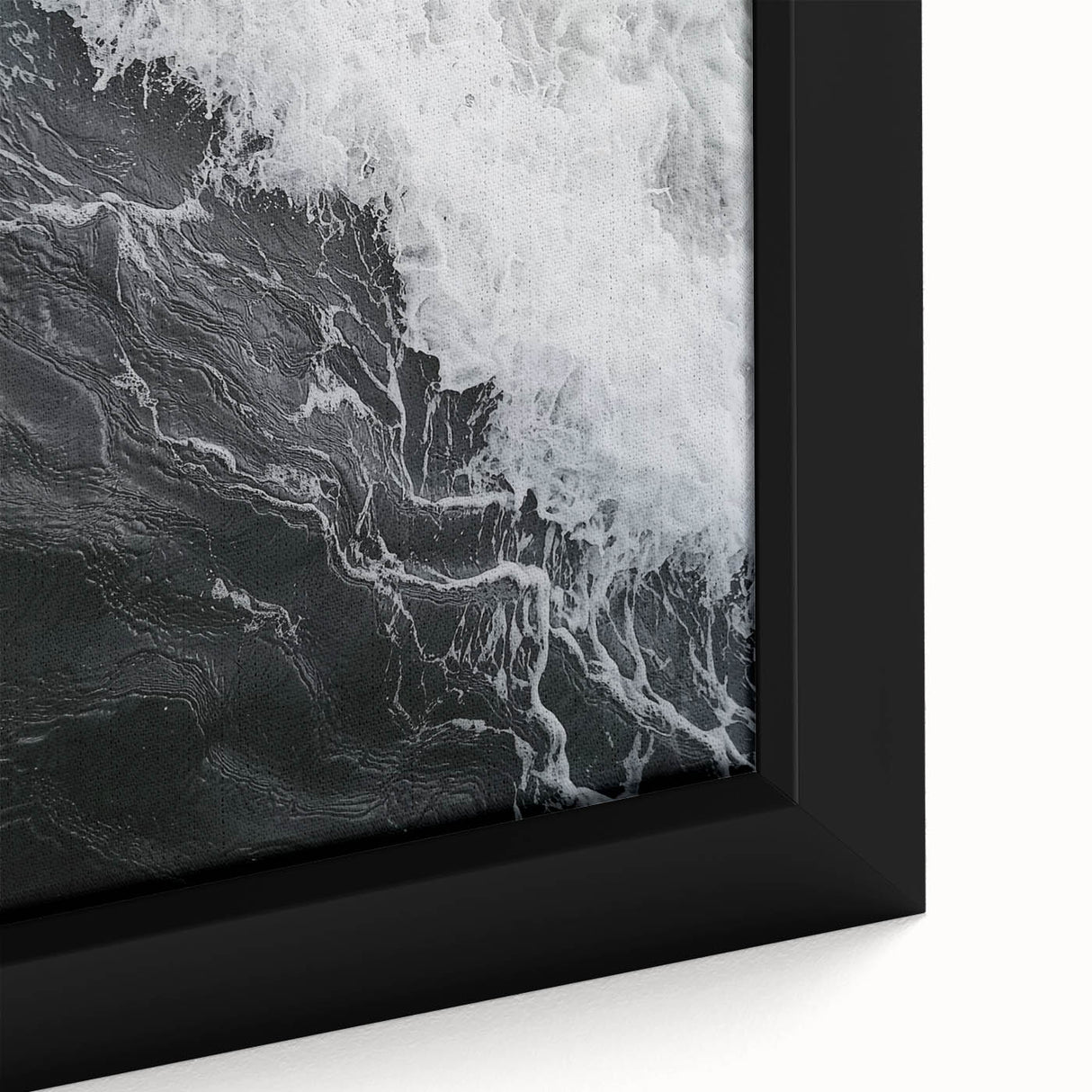 Extra large framed canvas featuring a close-up of textured, colorful art with predominantly black tones.