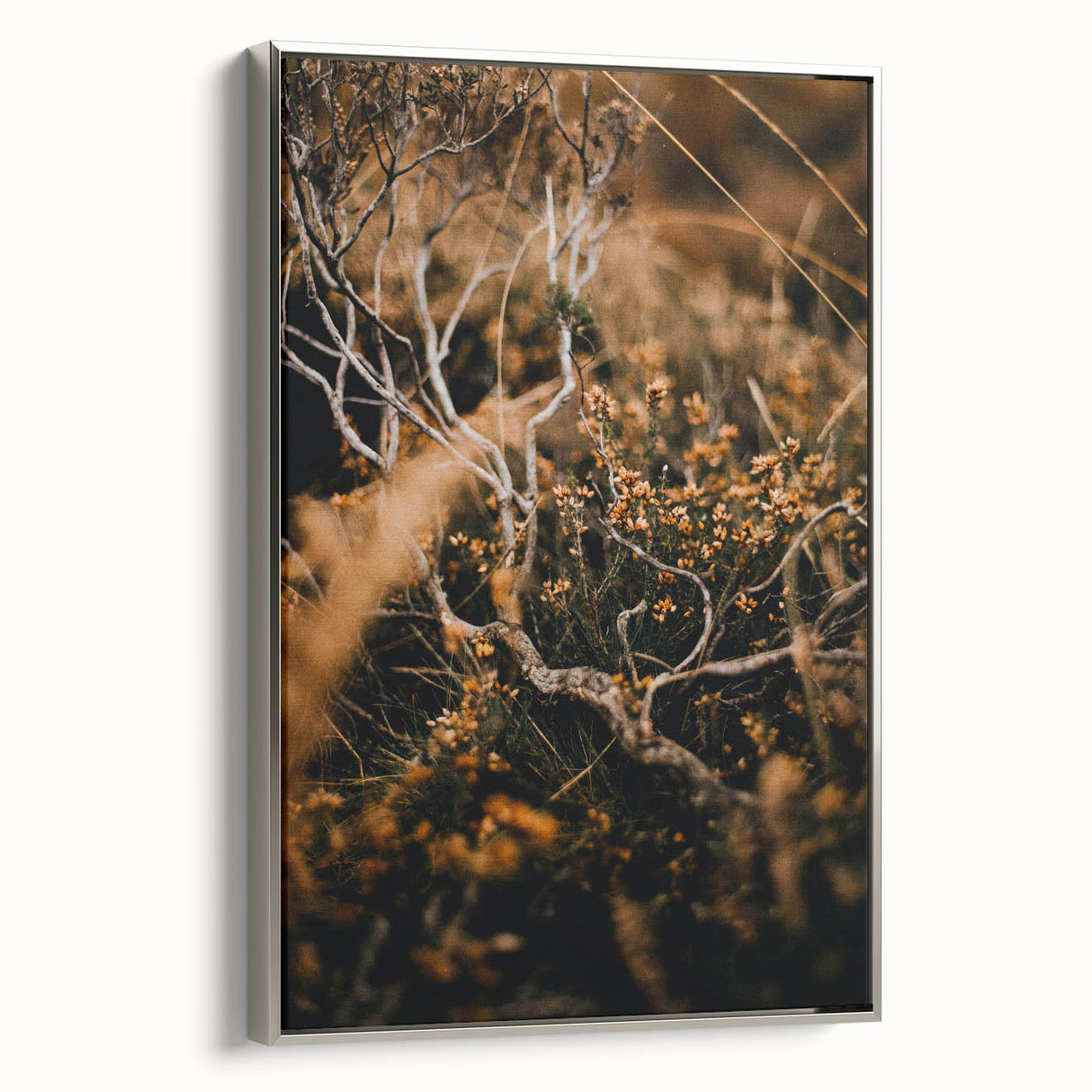 Framed canvas depicting a vintage landscape art painting of a fall scene in muted earth tones, ideal for living room decor.
