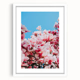 Abstract art print featuring swirling pastel shades on a white framed canvas, ideal for dining room decor.