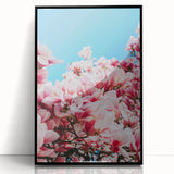 Large abstract wall art depicting spring with vibrant greens and yellows on a black framed acrylic.