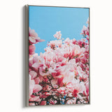 Landscape art painting of a spring scene on a framed canvas, featuring a blend of vibrant green and pastel colors.