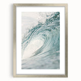 Textured abstract art print in silver frame, featuring soft gray and white swirls, ideal for modern bedroom decor.