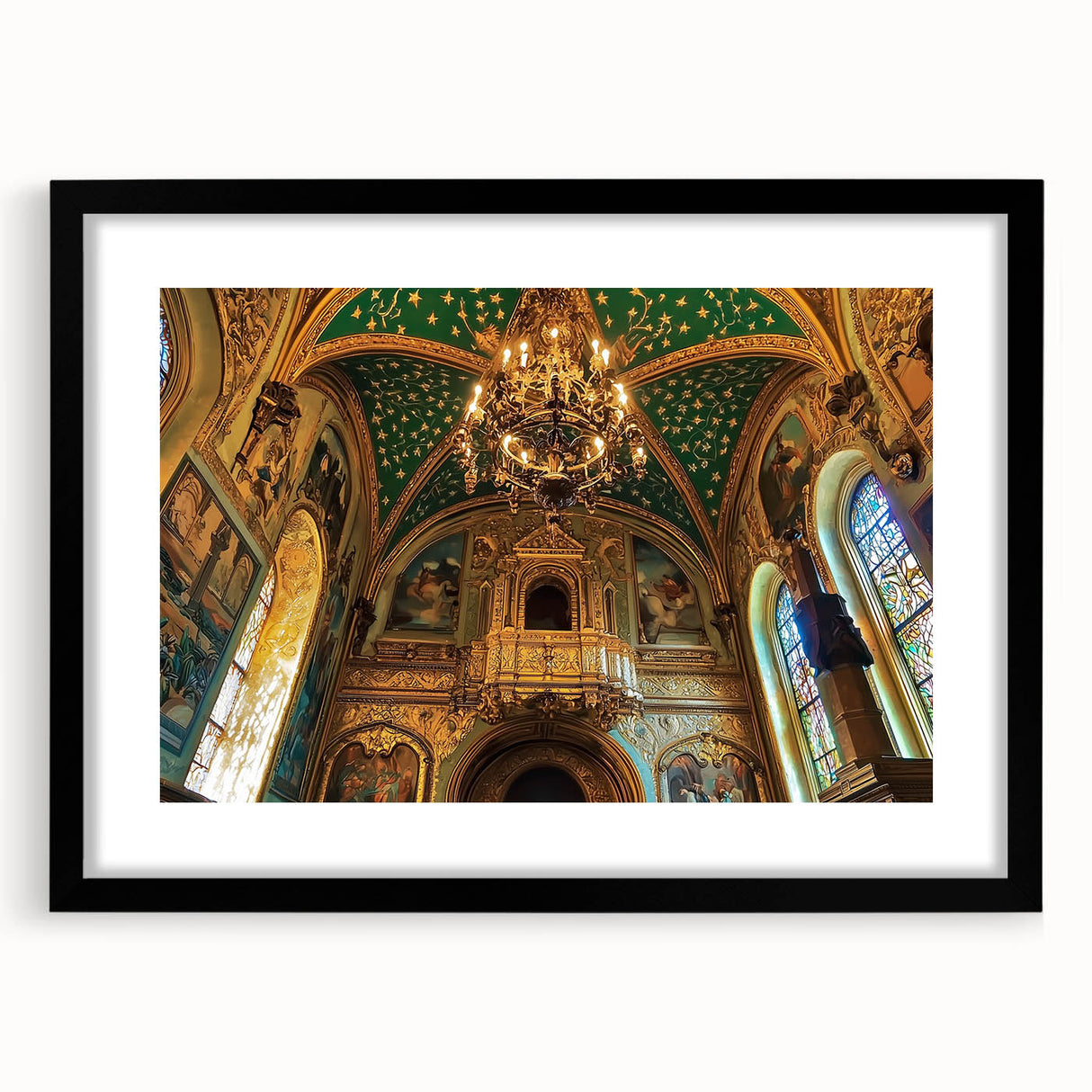 Black-framed landscape artwork featuring a picturesque castle surrounded by lush greenery, elegantly matted for a sophisticated display in home decor.
