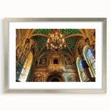 Framed landscape artwork depicting an elegant castle surrounded by lush greenery, featuring a silver mat and a classic design, perfect for enhancing home decor.