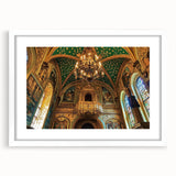 Elegant landscape painting of a castle framed in white with a mat, showcasing intricate details and vibrant colors, perfect for home decor or gallery display.