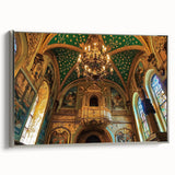 Framed canvas artwork showcasing a silver-framed landscape featuring a majestic castle surrounded by lush greenery, perfect for home decor or art enthusiasts.