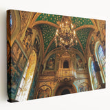 Stretched canvas artwork depicting a serene landscape with a majestic castle surrounded by lush greenery and vibrant blue skies, ideal for home decor.