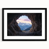 Framed landscape art print showcasing a serene cave scene with a black mat, perfect for home décor. The artwork features rich colors and detailed textures, ideal for enhancing any living space.