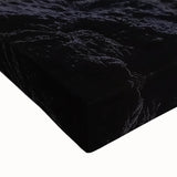 Close-up of a stretched canvas artwork depicting a vibrant landscape with intricate cave formations, showcasing rich colors and textures ideal for enhancing home decor.