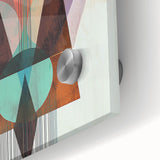 Close-up of an abstract geometric design on acrylic glass, showcasing vibrant colors and sharp edges that create a modern, artistic focal point for interior decor.