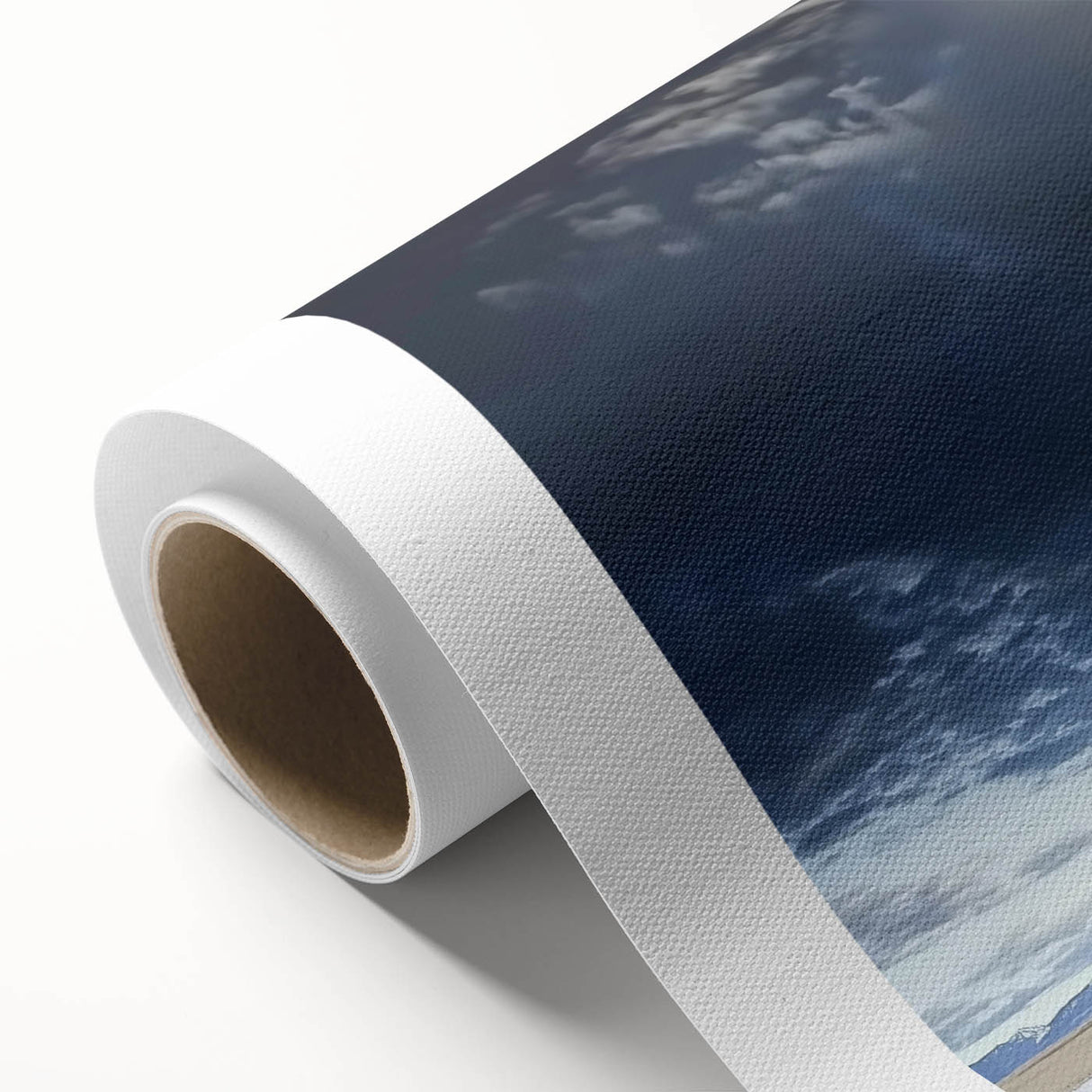 Rolled canvas showcasing a vibrant landscape barn design, featuring rich colors and detailed textures, securely packaged in a protective cardboard tube for easy transport.