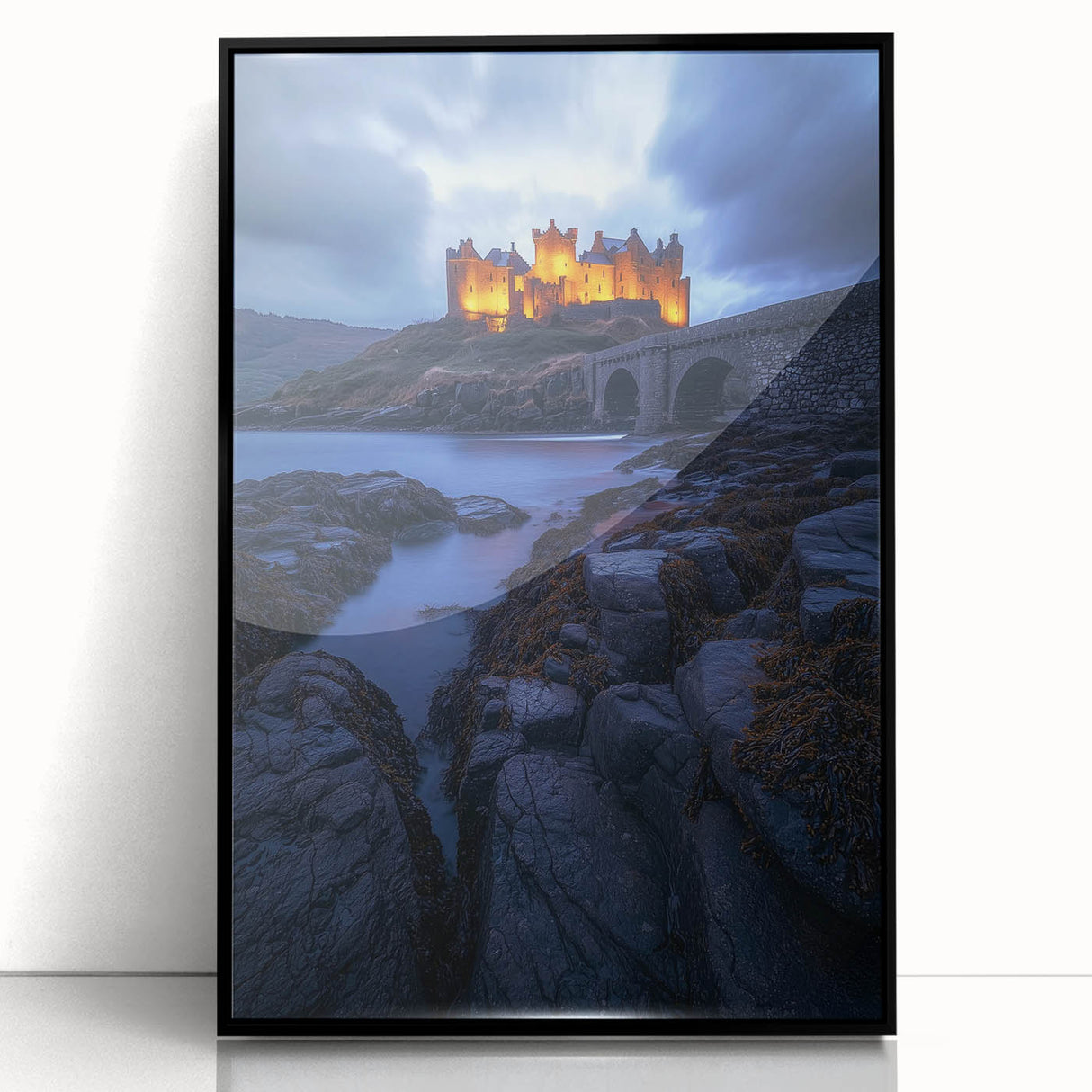Framed acrylic artwork showcasing a serene countryside landscape with vibrant green fields and a clear blue sky, set in a sleek black frame for modern decor.