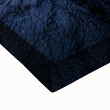 Close-up of a stretched canvas landscape artwork depicting a serene countryside scene, featuring lush green fields and a vibrant sky, ideal for home decor.