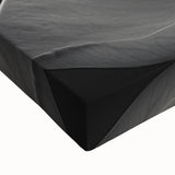 Black and white landscape art painting on a large stretched canvas, featuring a close-up floral design.