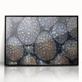 Large abstract wall art featuring swirling blue and green patterns on a framed acrylic, ideal for modern living room decor.