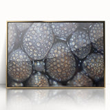 Framed acrylic print of close-up nature elements in muted green and brown, ideal for modern nursery decor.