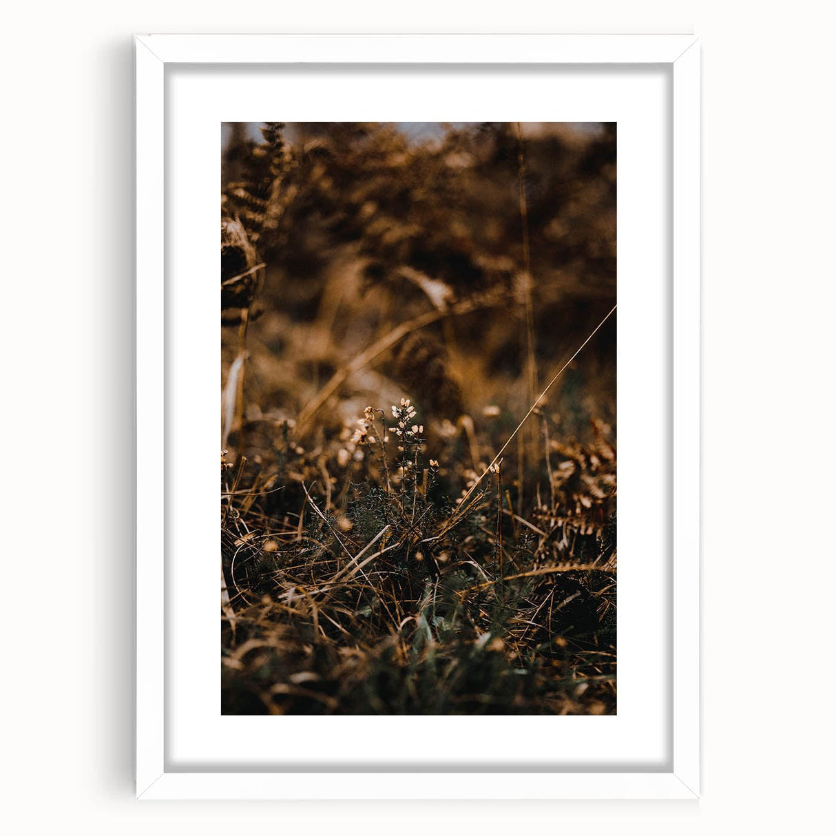 Abstract art print featuring autumnal colors on a white framed canvas, ideal for dining room decor.