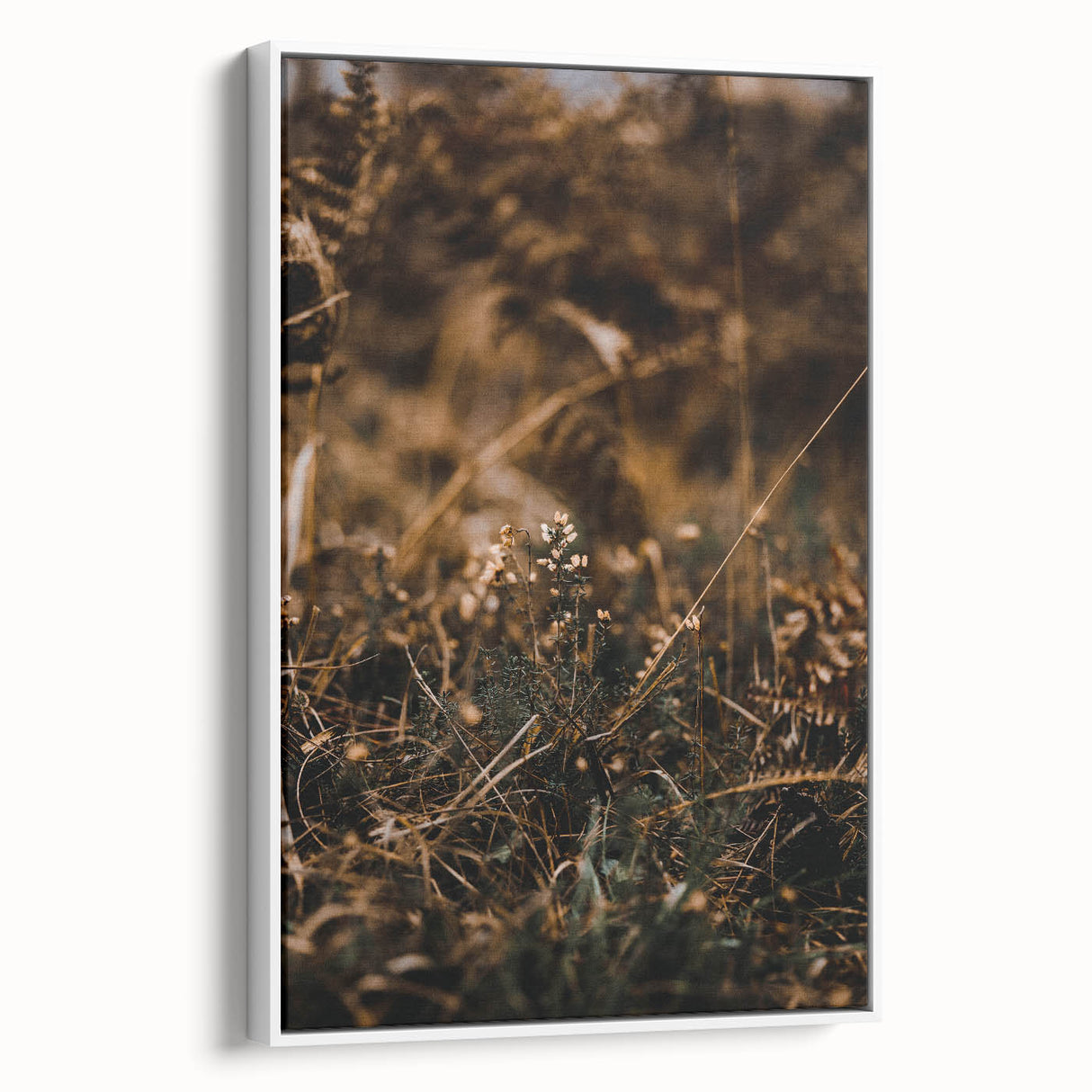 Vintage poster art of autumn trees on a large framed canvas, blending vibrant orange and brown tones.