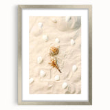 Abstract textured art print with swirling patterns in warm orange and yellow hues, framed in silver.