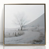 Winter scene with snow-covered trees in muted whites and blues on a framed acrylic, perfect for modern nursery wall art.