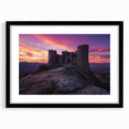 Framed landscape artwork showcasing a majestic castle scene, presented with a black mat and frame, perfect for enhancing home decor and artistic ambiance.