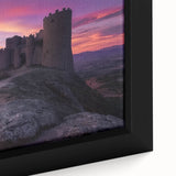 Close-up view of a beautifully framed canvas artwork depicting a serene landscape with a majestic castle surrounded by lush greenery, showcasing vibrant colors and intricate details, perfect for home decor enthusiasts.