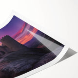 Rolled canvas print showcasing a vibrant landscape featuring majestic castles amidst lush greenery, elegantly packaged in a protective cardboard tube for safe delivery.