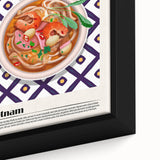 Close-up of a black framed canvas featuring a textured depiction of colorful food dishes.
