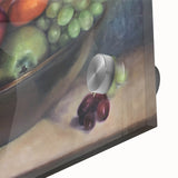 Close-up of large abstract wall art featuring assorted fruits in vibrant colors on acrylic glass.