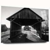 Landscape acrylic glass artwork showcasing a modern barn design, viewed from the side without pins, emphasizing the vibrant colors and intricate details. Ideal for home decor.