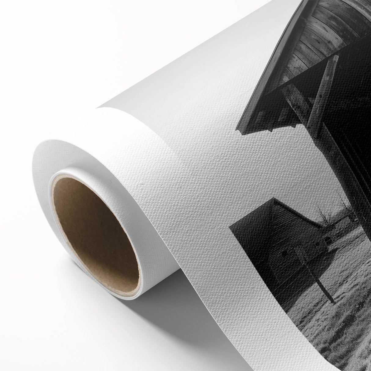 Rolled canvas showcasing a vibrant landscape barn design, elegantly packaged in a protective cardboard tube, ideal for home decor enthusiasts seeking rustic charm.