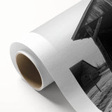 Rolled canvas showcasing a vibrant landscape barn design, elegantly packaged in a protective cardboard tube, ideal for home decor enthusiasts seeking rustic charm.