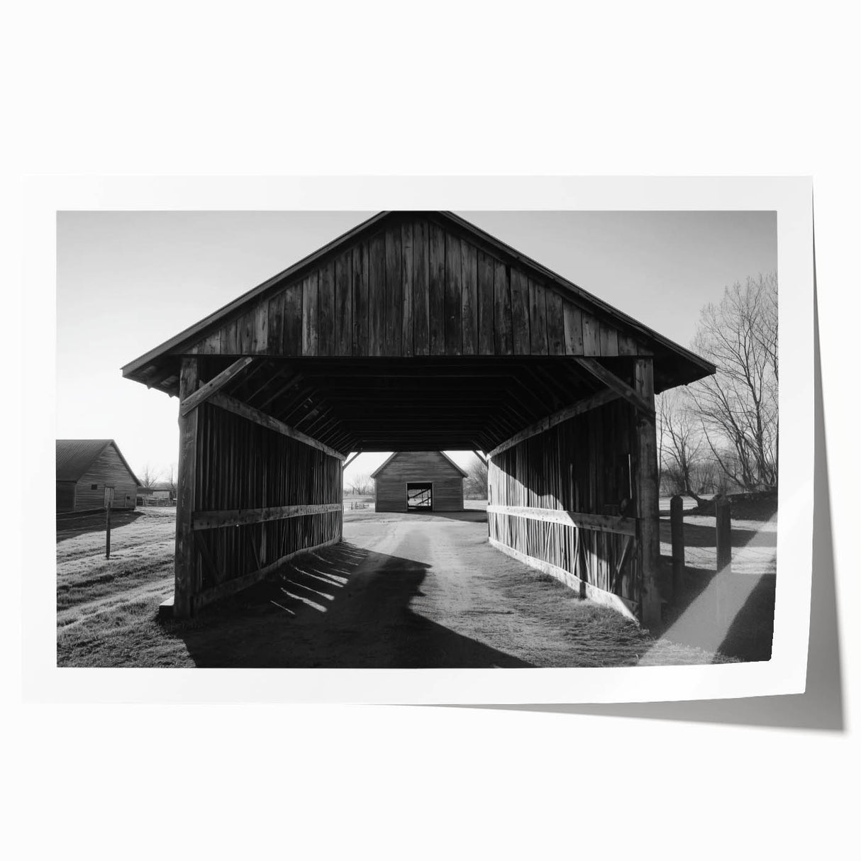 Rolled landscape canvas print depicting a serene barn setting surrounded by lush greenery, showcasing vibrant colors and fine details, perfect for rustic home decor.