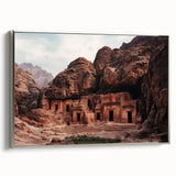 Framed canvas artwork depicting a stunning landscape of canyons, featuring rich colors and intricate details, showcased with a sleek silver frame, perfect for home decor.