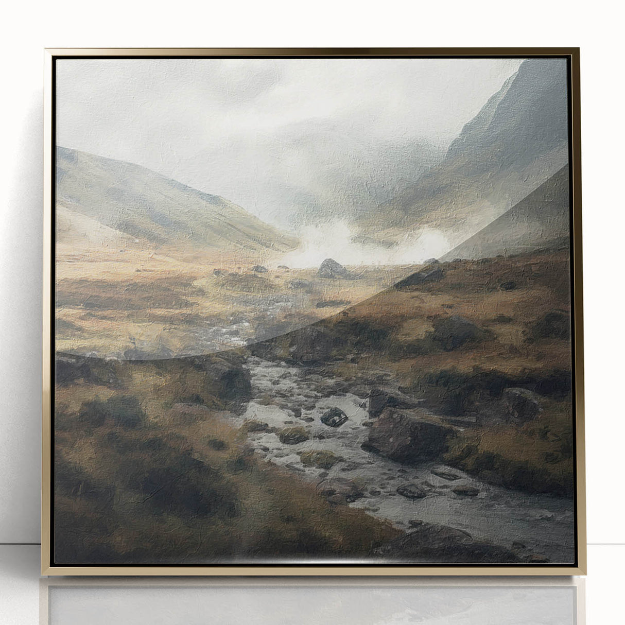 Framed landscape wall art depicting a serene countryside scene, featuring lush green fields and a clear blue sky, accented with a gold frame for an elegant touch.