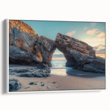 Framed canvas artwork depicting a serene countryside landscape with vibrant green fields, rolling hills, and a clear blue sky, presented in a sleek white frame, perfect for home decor.