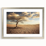 Framed landscape artwork depicting a serene desert scene, featuring warm sandy hues and a silver mat, perfect for home decor or office ambiance.