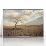 Framed acrylic artwork depicting a serene desert landscape with warm tones of orange and beige, accented by a sleek white frame, perfect for modern decor.