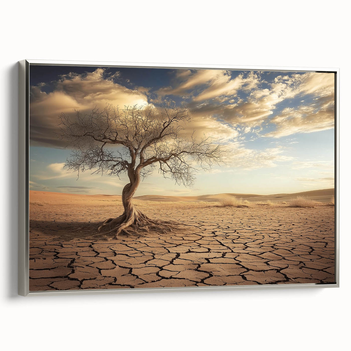 Framed canvas artwork depicting a vibrant desert landscape, featuring warm tones of orange and gold, with a sleek silver frame highlighting its elegance. Perfect for home decor or as a gift for art lovers.