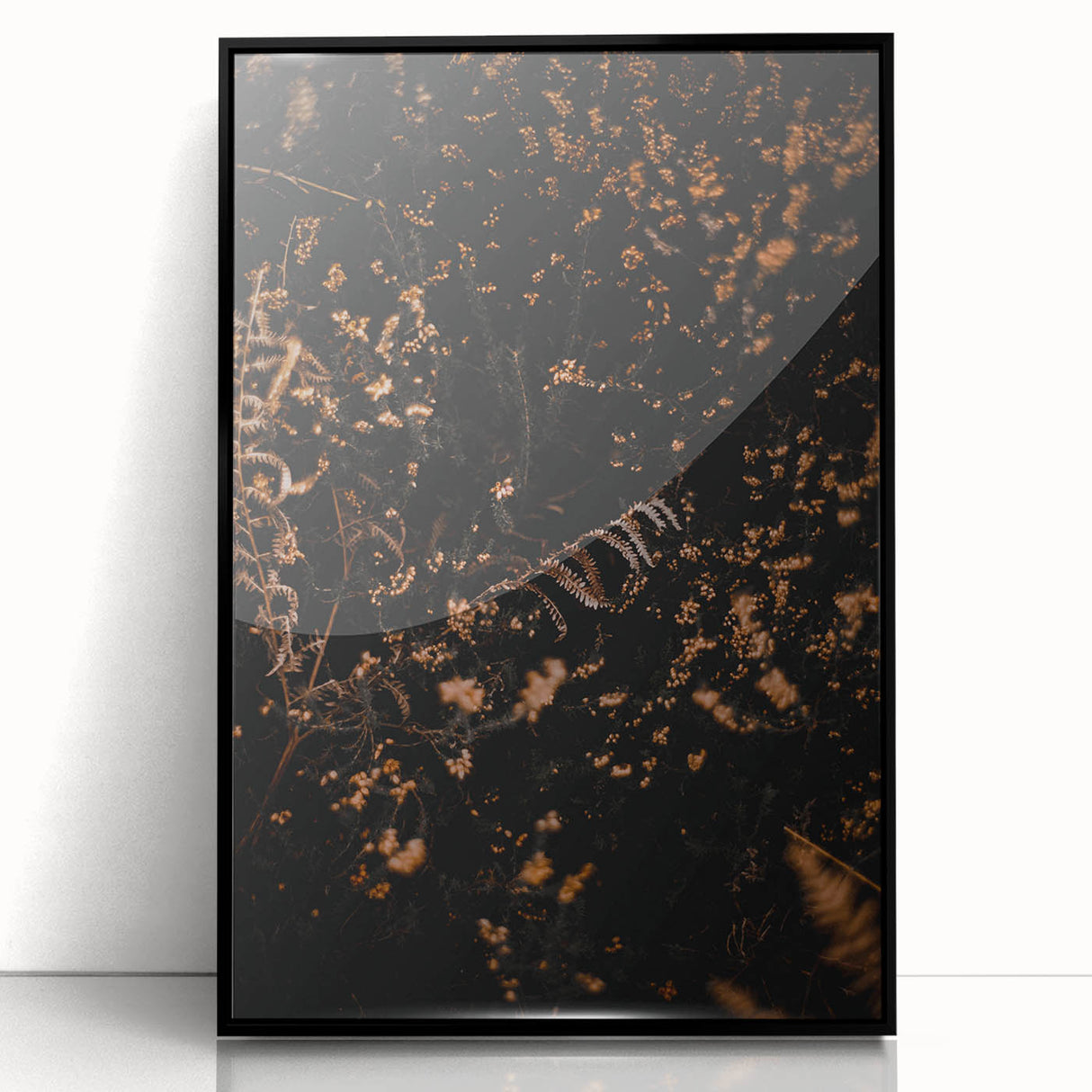 Large abstract wall art depicting fall trees in orange and yellow, framed in black acrylic.