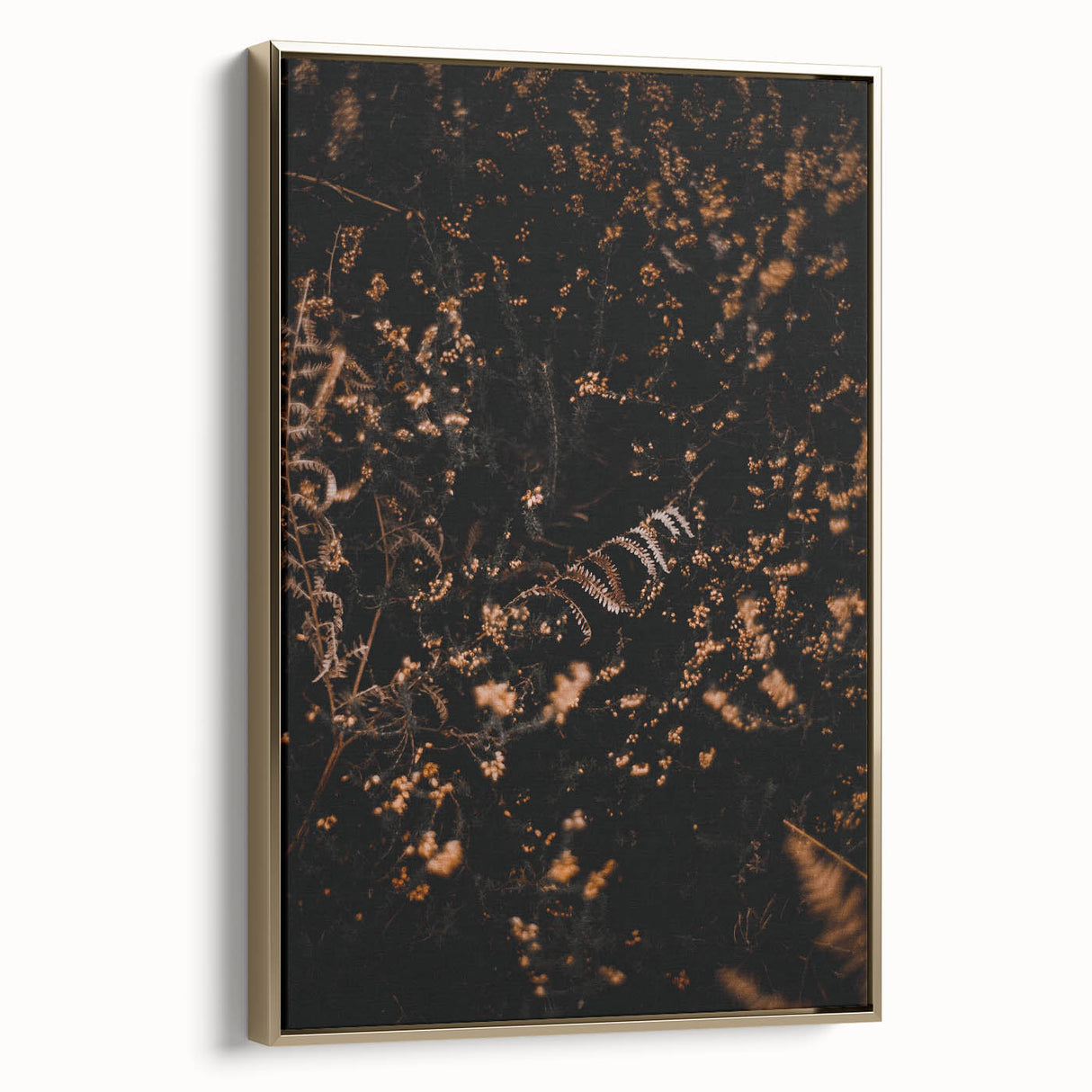 Framed canvas wall art depicting a vintage landscape scene in black with gold accents, ideal for bedroom decor.