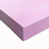 Large art canvas featuring a black and white landscape painting with detailed trees and expansive skies.